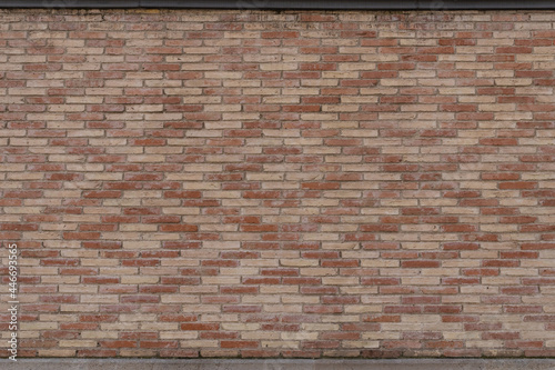 Brick wall with diamond pattern. Orange and red brick wall background. Old red brick texture background. Material for 3D models.
