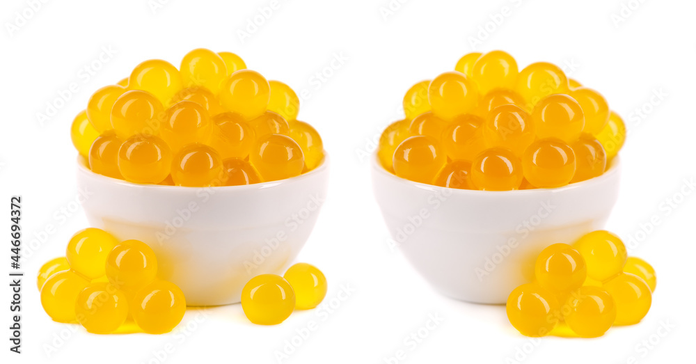 Yellow tapioca pearls for bubble tea isolated on white background Yellow tapioca pearls for bubble tea isolated on white background