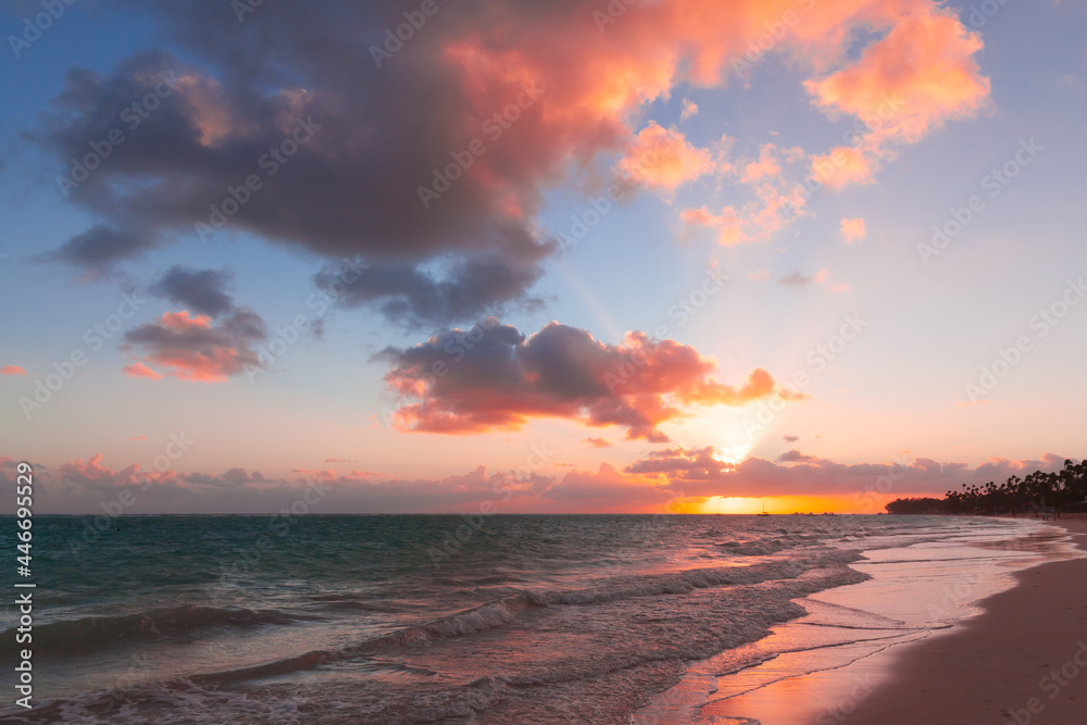 Seascape with colorful clouds on a sunrise over Atlantic Ocean