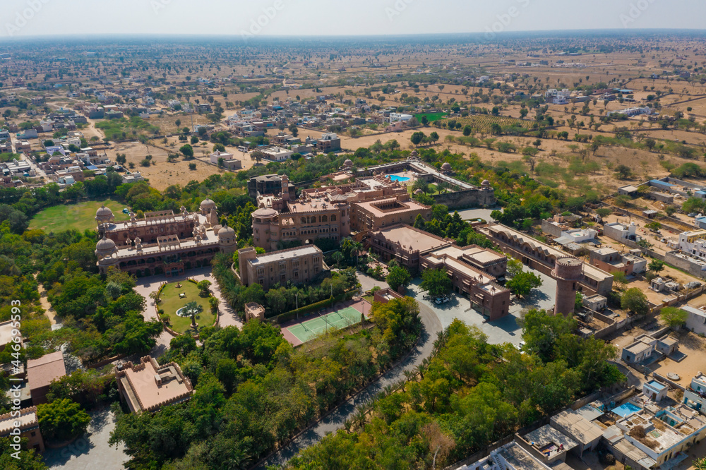 Aerial view of a luxury hotel and resort in Khimsar township, Kheenvsar, Rajasthan, India. Aerial view of a luxury hotel and resort in Khimsar township, Kheenvsar, Rajasthan, India.