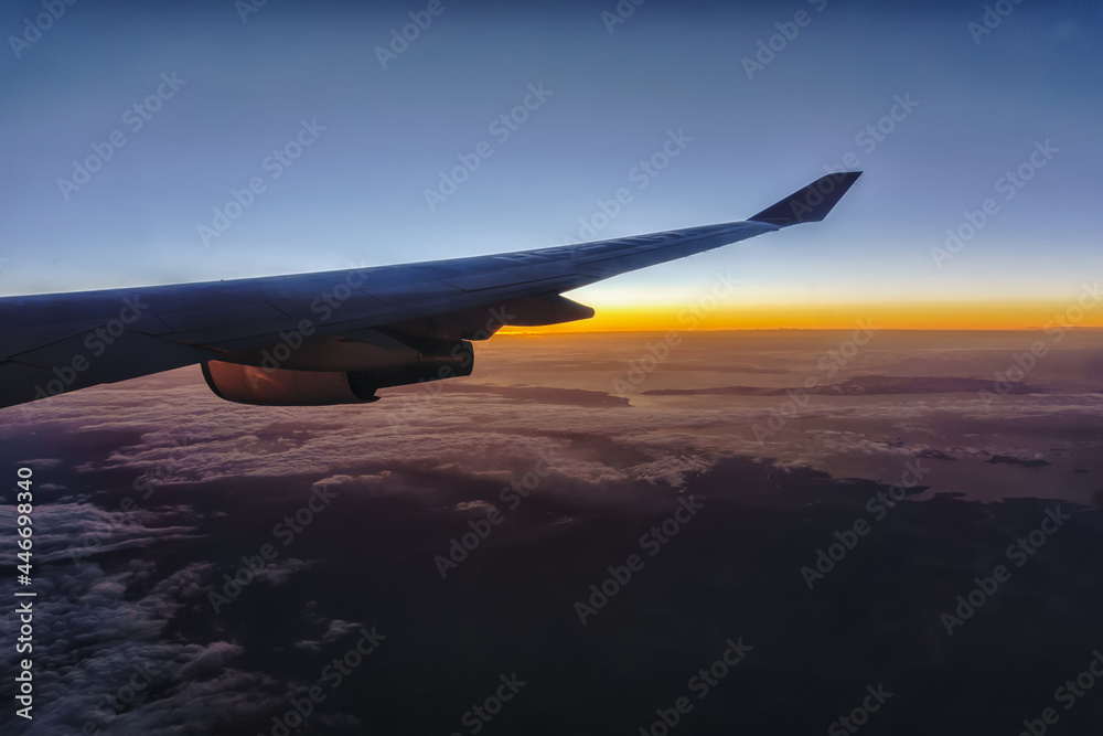 Beautiful sunrise with aircraft wing during View from windows aircraft