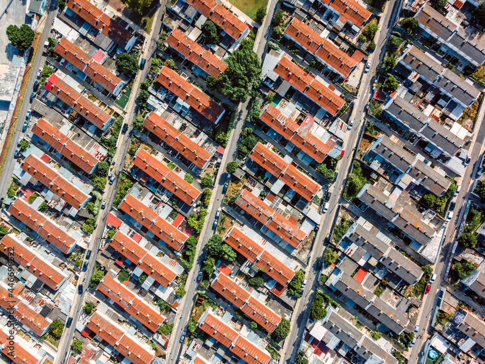Aerial view of a residential area with buildings forming a geometric pattern in Carnide, Lisbon, Portugal. Aerial view of a residential area with buildings forming a geometric pattern in Carnide, Lisbon, Portugal.