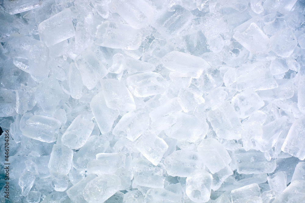 Lots of white ice cubes, stacked on top of each other to be used for organizing the party, background, macro