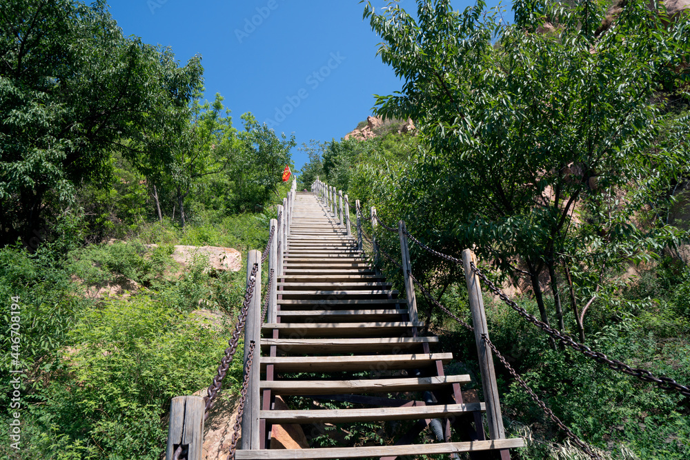Steep ladder on the road uphill