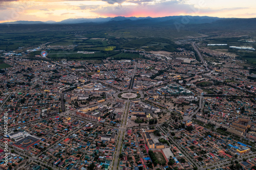 The cityscape of Turks Bagua City in China at dusk. photo