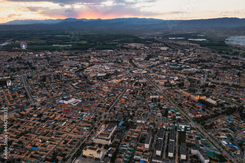 The cityscape of Turks Bagua City in China at dusk. photo