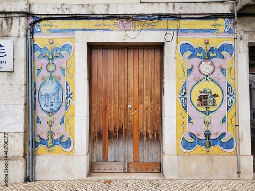Colorful Yellow Blue Tile Wooden Plank Door in Lisbon Portugal 