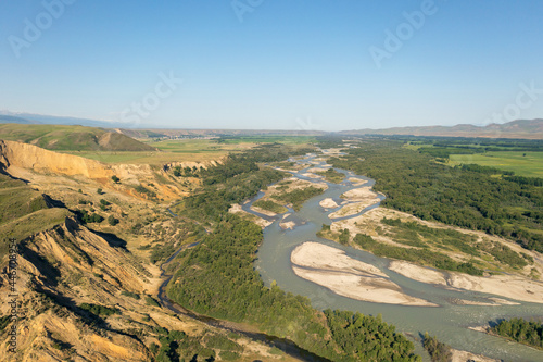 Grassland and river in a sunny day. photo