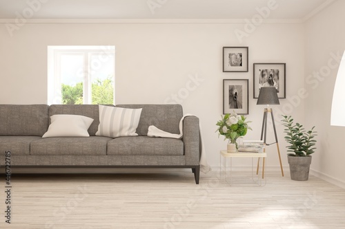 White living room with sofa. Scandinavian interior design. 3D illustration © AntonSh