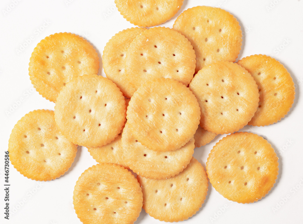 An image top view isolated circle crackers or snack or biscuits treat gourmet or junk food. An image top view isolated circle crackers or snack or biscuits treat gourmet or junk food.