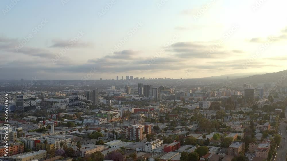 Aerial, panoramic view of the cityscape and sunset, drone view Aerial, panoramic view of the cityscape and sunset, drone view