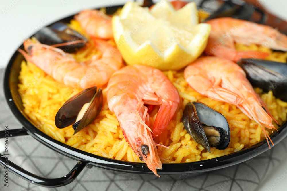 Concept of delicious food with Spanish Paella Concept of delicious food with Spanish Paella
