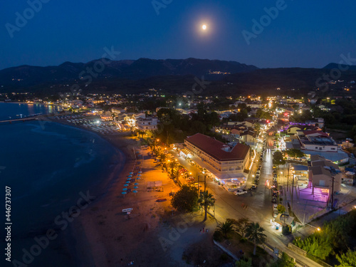 Roda beach by night corfu Greece aerial view full moon
