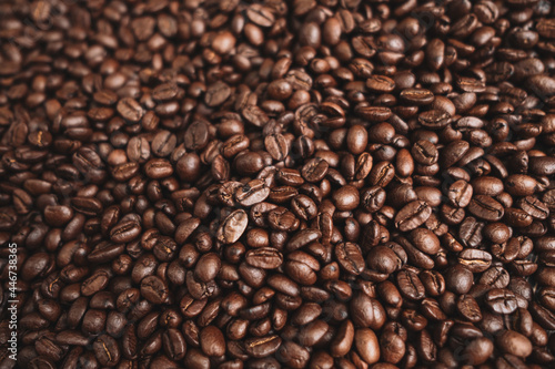 Premium Roasted coffee beans on background