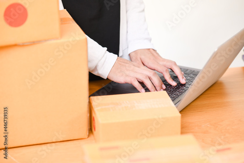online business work Female hands are typing and talking to customers.