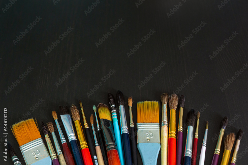 Paint brushes. Selective focus. Copy space. Close up. Paint brushes. Selective focus. Copy space. Close up.