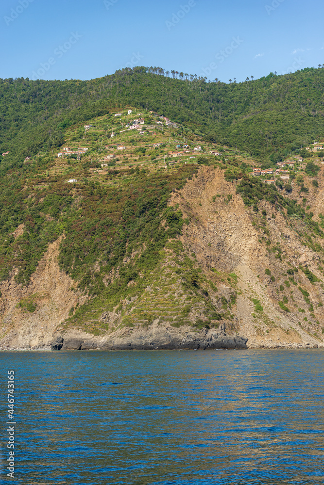 Coast of the Cinque Terre with the small rural village of Fossola, Ligurian Sea, La Spezia province, UNESCO world heritage site, Liguria, Italy, Europe. Cliff called Grimaldo.