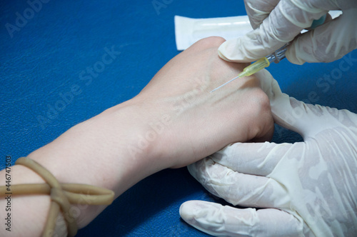 Fotografija Close up of iv drip in patient's hand