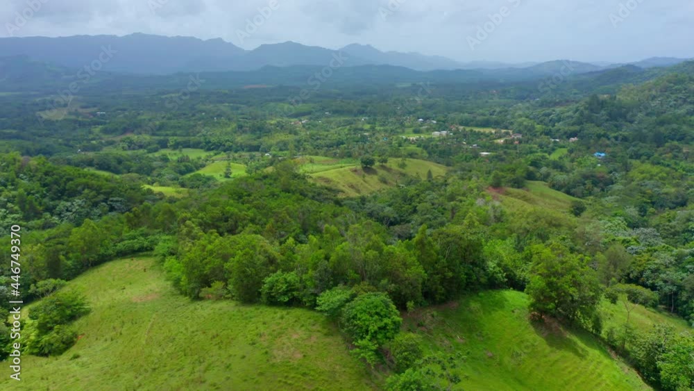 Aerial forward over amazing green valleys at Villa Altagracia, Los Mogotes. Dominican Republic