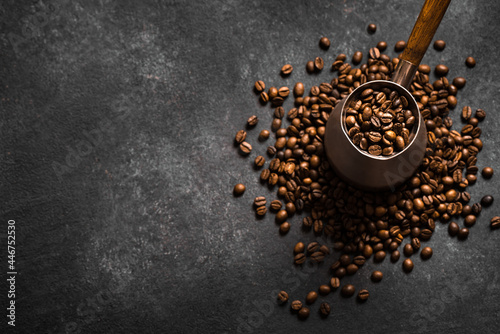 Fotografie Roasted coffee beans and turk