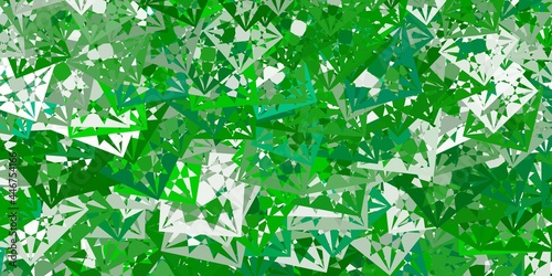 Light Green vector pattern with polygonal shapes.
