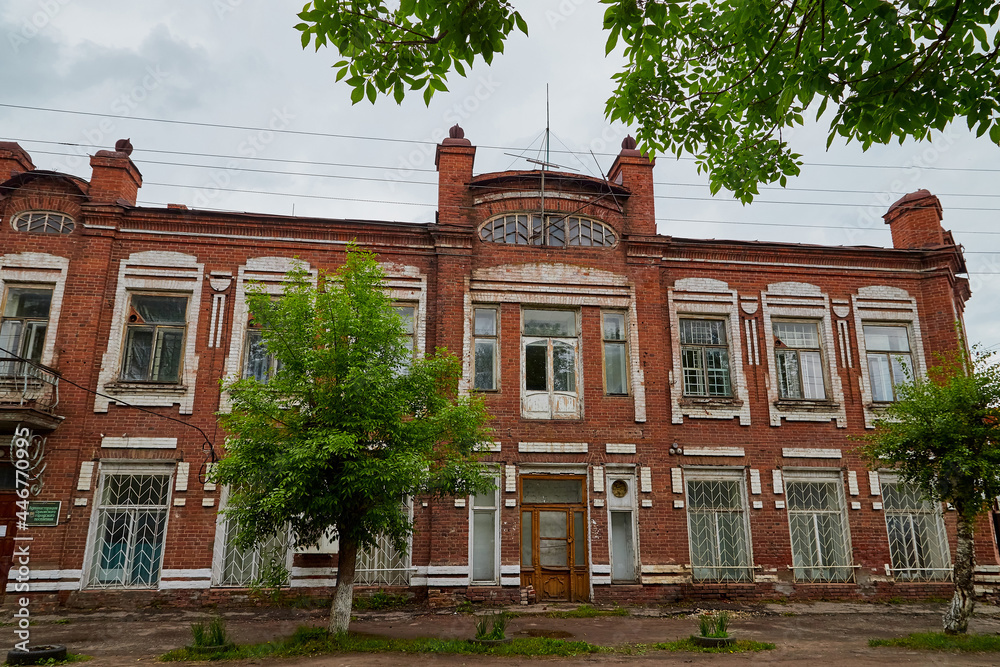Fototapeta premium A stone or brick old house in a Russian city. An old building