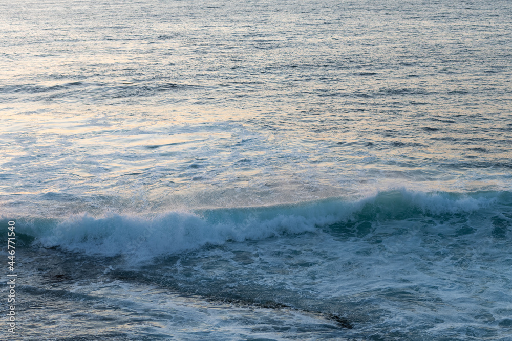 wavy ocean water with waves on sandy beach. seascape nature. summer vacation. water waves on the sea wavy ocean water with waves on sandy beach. seascape nature. summer vacation. water waves on the sea