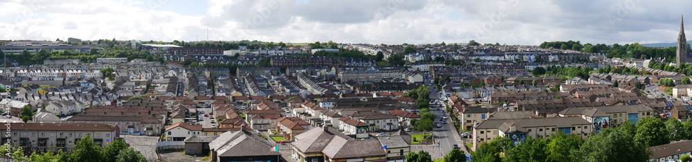A panoramic view of the Bogside area of west Derry / Londonderry looking from the City walls toward the Creggan Estate.