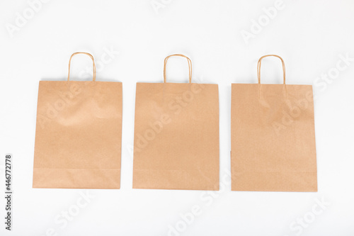 Three craft packages lie on a white background. Mock-up.