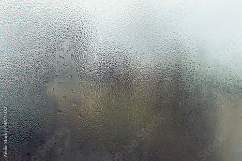 texture of a window closeup, glass with water droplets