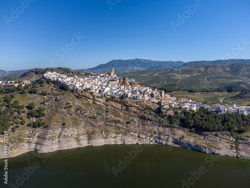 Panoramic of Iznajar town in Andalusia seen from aerial view of drone