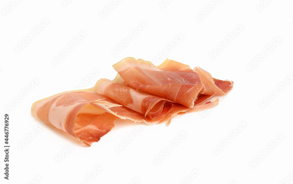 sliced prosciutto jerky into thin slices, food isolated on white background sliced prosciutto jerky into thin slices, food isolated on white background