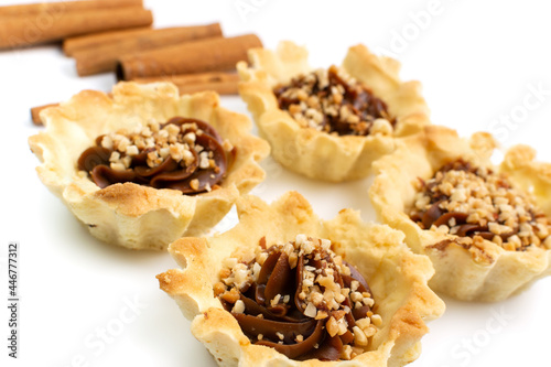 fresh pastries with nuts, pastry on a white background