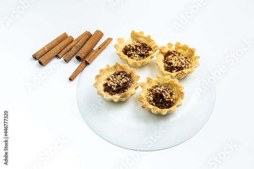 fresh pastries with nuts, pastry on a white background