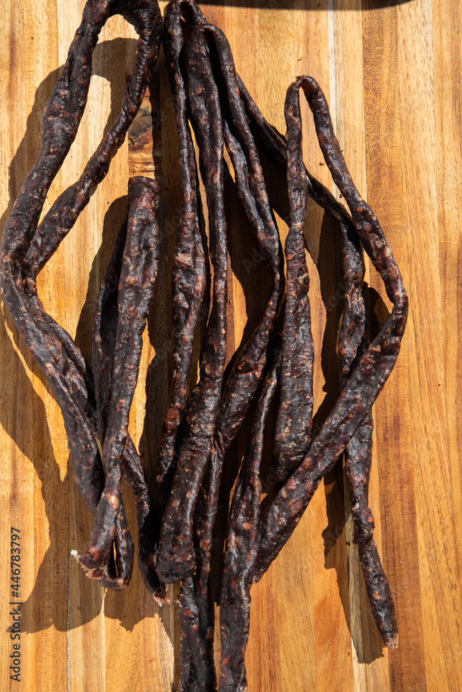 Dried and cured meat sausage. A traditional South African food snack also known as droewors.