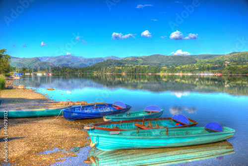 Leisure rowing boats on the water The Lake District England at Ullswater UK