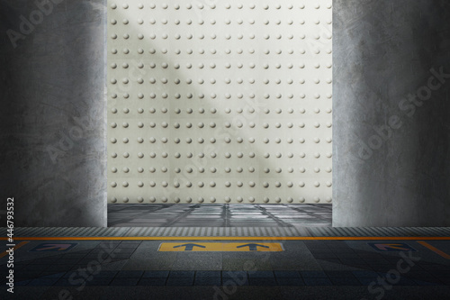 Concrete door open to room where the wall are patterned with round buttons and floor in front has arrows indicating the entrance Abstract background for modern technology
