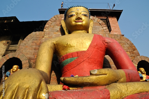 This statue of Buddha is located at the Swayambhunath Temple in Kathmandu, Nepal. This Buddha is the lord of Stillness and resists temptation.