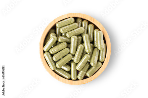 Herbal medicine capsules isolated on white.