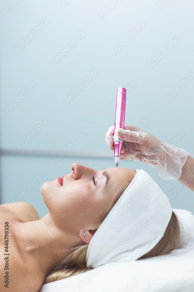 Woman having facial treatment in beauty salon, closeup. Oxy derma therapy