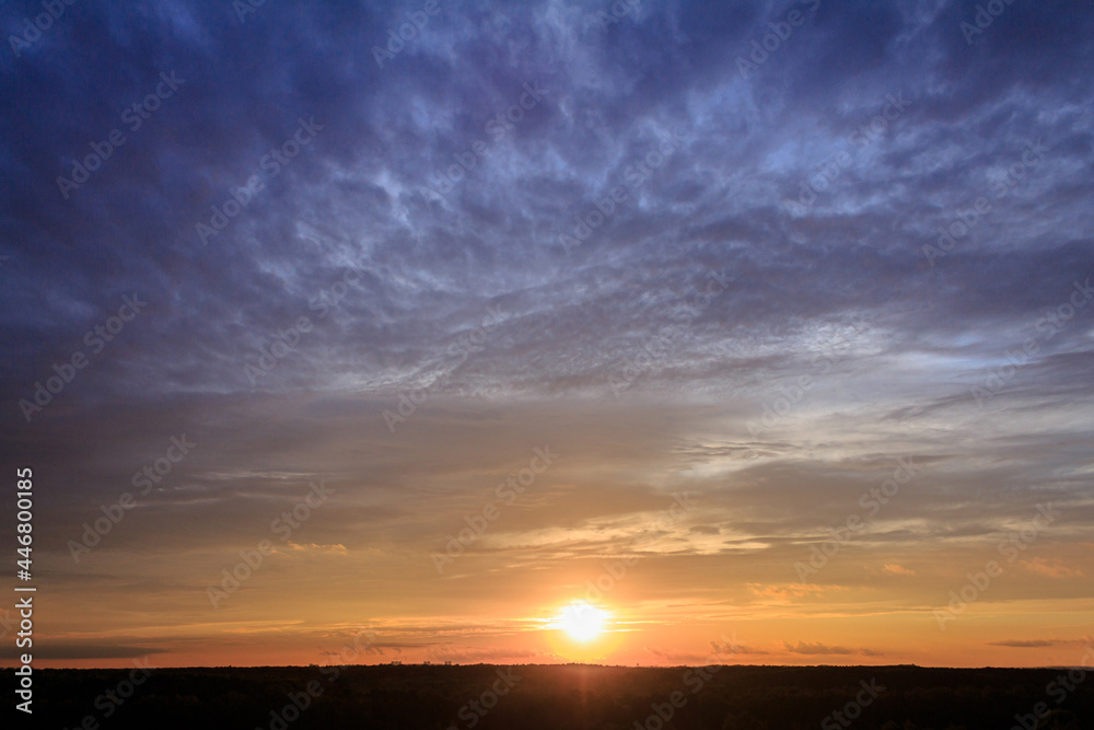 Colorful sunset with clouds in the evening Colorful sunset with clouds in the evening