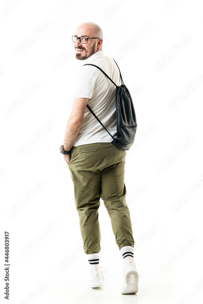 Back view of funny happy hipster style geek walking and turning to camera. Full length portrait isolated on white background Back view of funny happy hipster style geek walking and turning to camera. Full length portrait isolated on white background