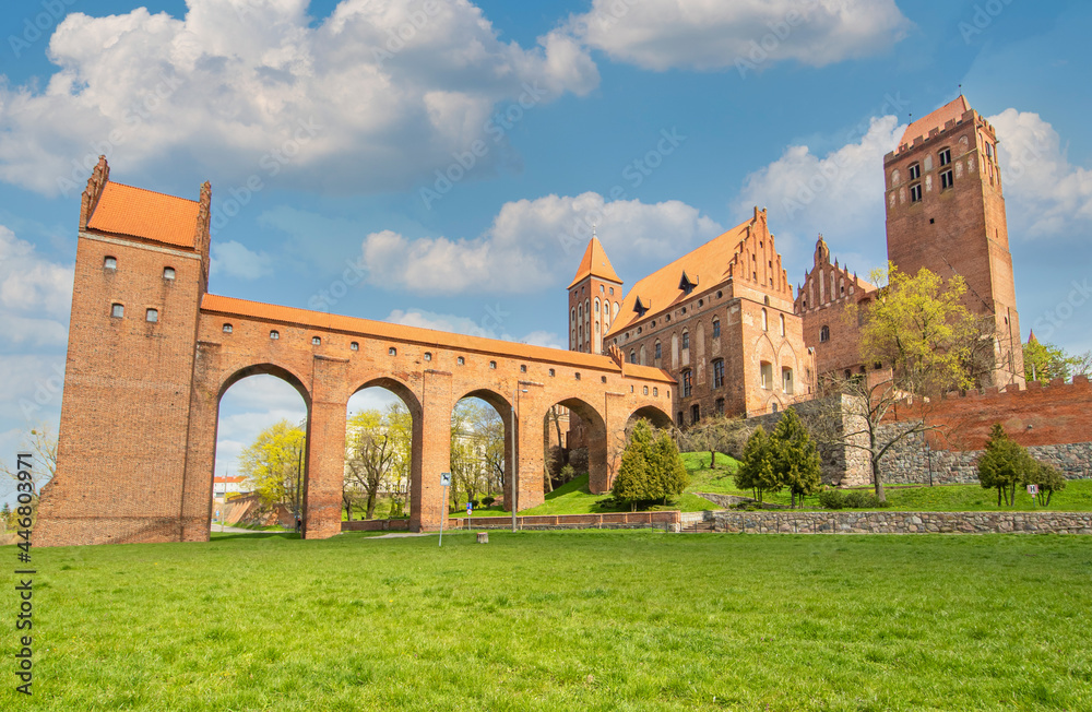 Fototapeta premium Kwidzyn, Poland - built in 1233 and a fine example of Teutonic Knights' castles architecture, the Kwidzyn Castle is famous for its red brick and unusual shape