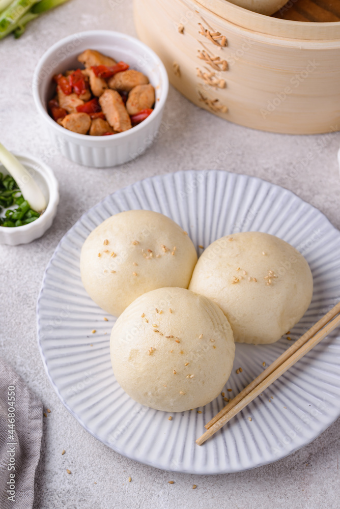Chinese steamed buns baozi with steamer Chinese steamed buns baozi with steamer