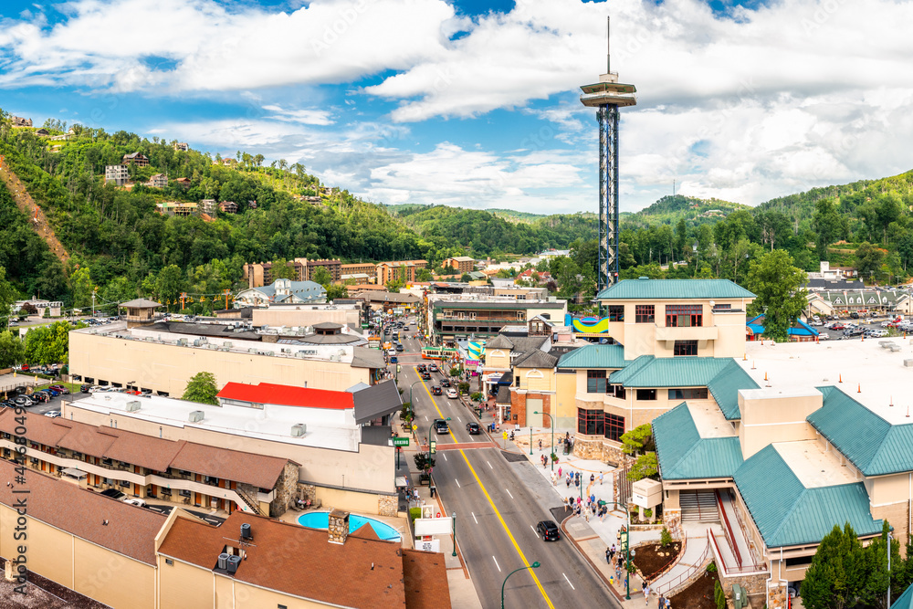 Aerial view of Gatlinburg above US-441. Gatlinburg is a popular mountain resort city in Sevier County, Tennessee, as it rests on the border of Great Smoky Mountains National Park.