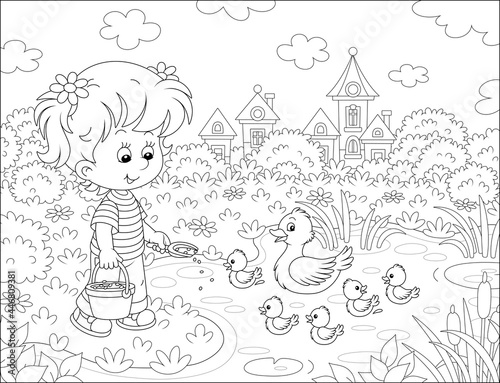 Little girl farmer standing with a bucket of feed grain and feeding a merry brood of small ducklings and a cute duck on a pond in a village, black and white vector cartoon illustration