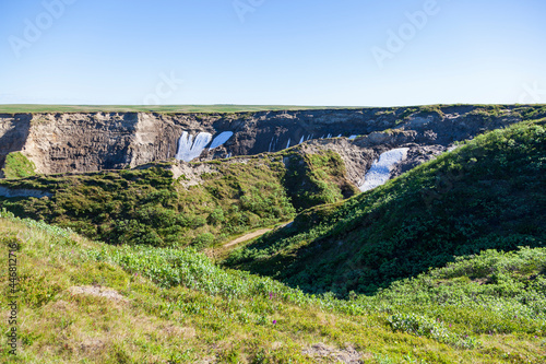 Landscape of the forest-tundra in summer, the sandy river bank. Arctic Circle, tunda. Beautiful landscape of tundra