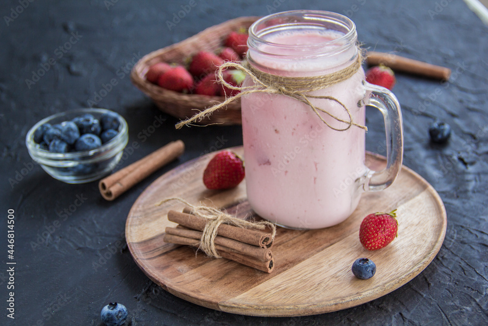 Healthy smoothie of fresh summer berries. Creative atmospheric decoration Healthy smoothie of fresh summer berries. Creative atmospheric decoration