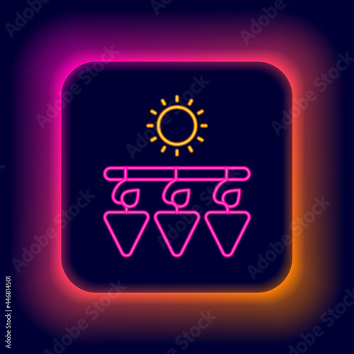 Glowing neon line Drying grapes icon isolated on black background. Dried grapes. Colorful outline concept. Vector