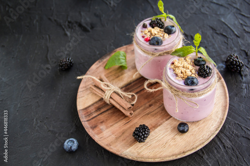 Healthy smoothie of fresh summer berries. Creative atmospheric decoration